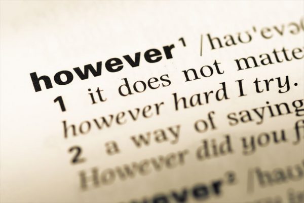 Close up of old English dictionary page with word however